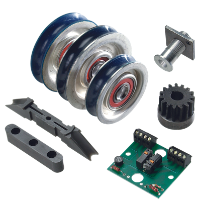 Assorted mechanical and electronic components, including wheels, a gear, and a circuit board.
